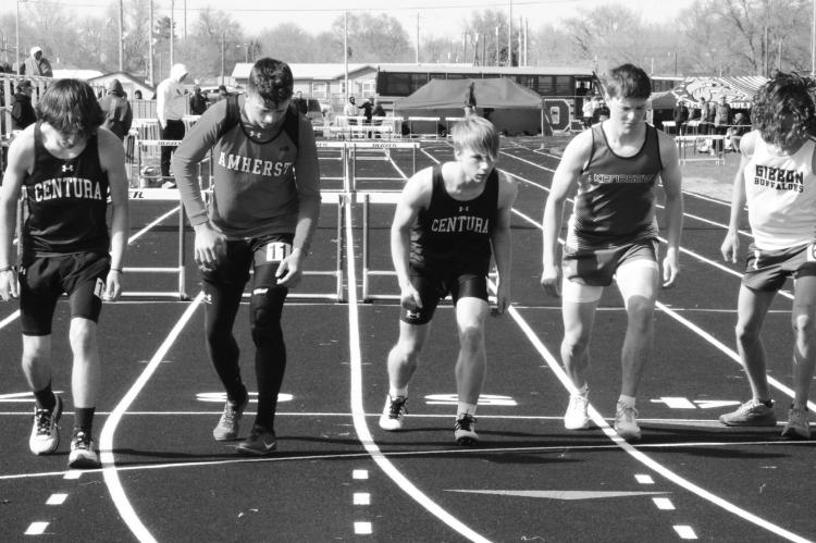 CENTURA’S Alec Plate and Zavery Jensen race away from the starting line in the boys’ 800-meter run last week. The Centurions placed ninth and sixth, respectively in that race. Photos by Monte Steele