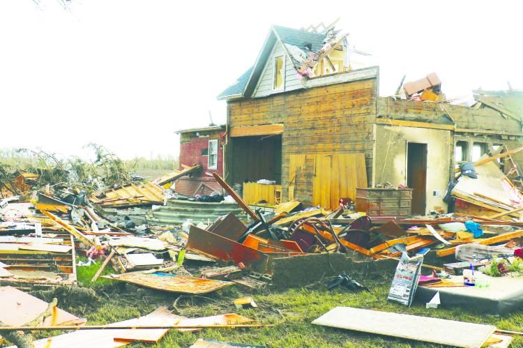 CHAD JACOBSEN’S rural Elba home was nearly completely destroyed after it was struck by an EF3 tornado on Friday afternoon. Photos by Michael Rother